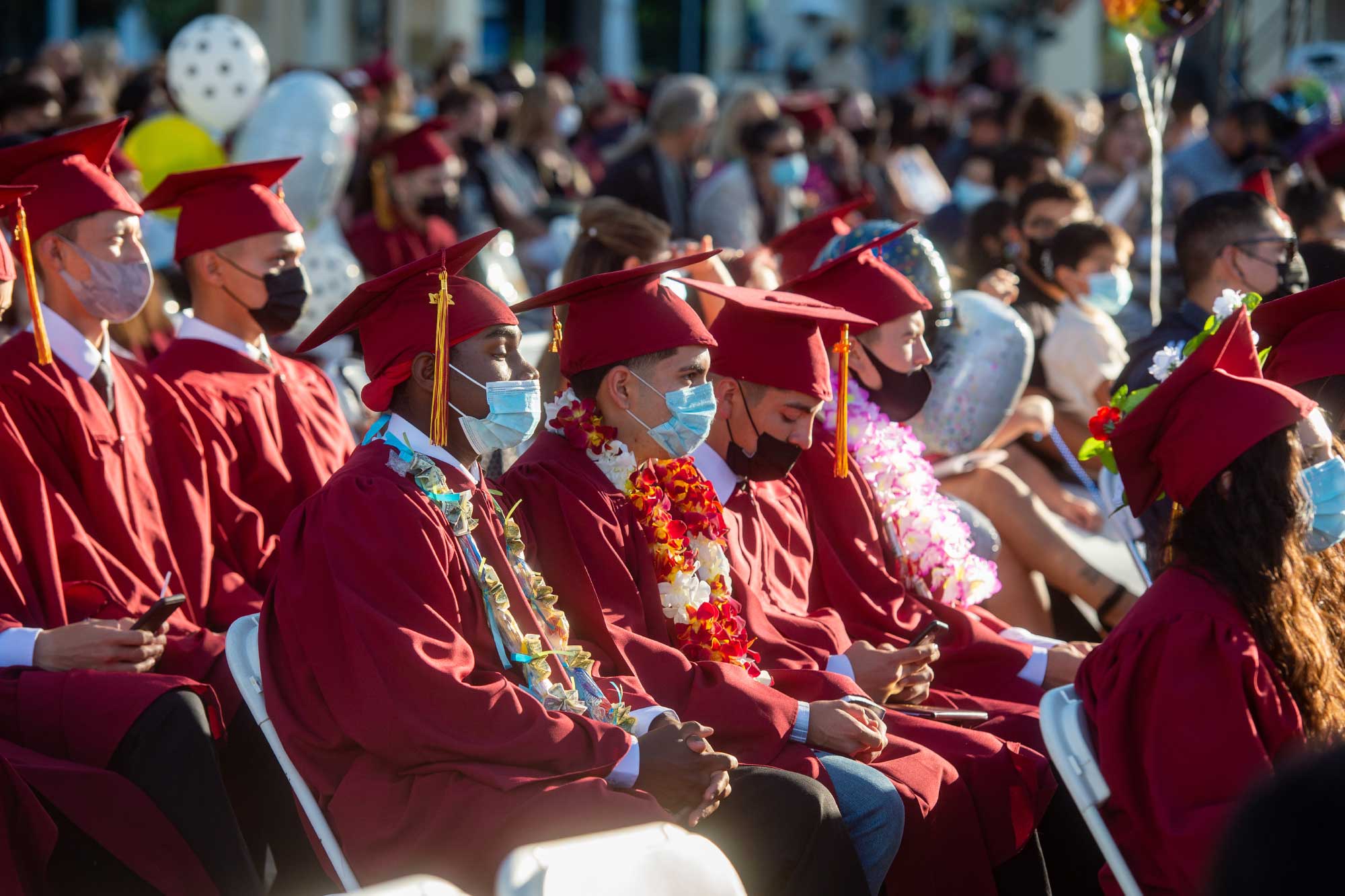 CCPA Students sitting at their graduation ceremony wearing Academic Regalia